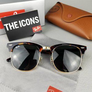 Ray-Ban RB3016 green sunglasses.
